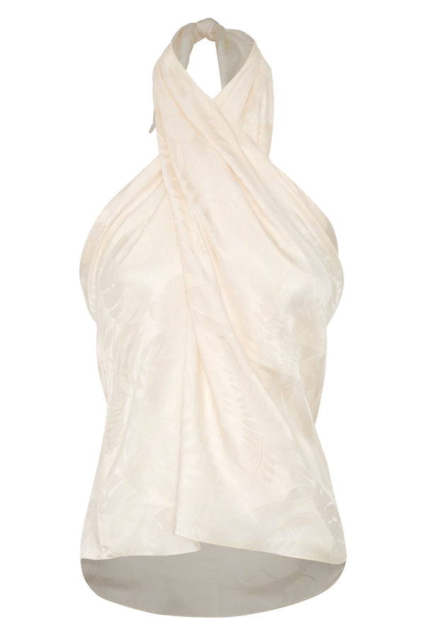 Ivory silk jacquard halter blouse with a draped, wrap-style front and rainforest pattern.