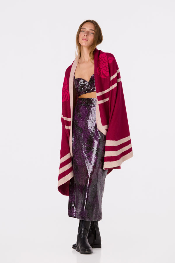 Model wearing the Delirio Sequin Top in Purple Rainforest with a matching midi skirt and shawl.