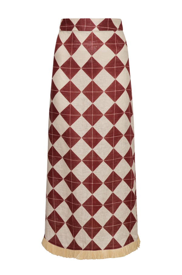 El Carmen linen midi skirt with burgundy rhombus pattern on ivory and raffia fringe hem.