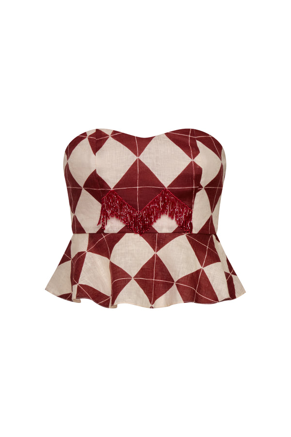 Burgundy and ivory rhombus print linen peplum top with hand-embroidered fringe detailing.